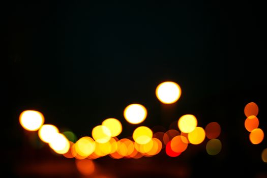 Abstract defocused lights of the night city bokeh background