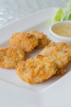 close up Thai Food Fried Fish Cake (Tod Mun Pla) with sweet sauce