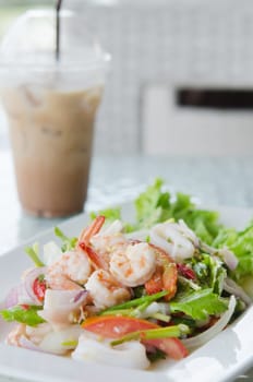 mixed  vegetable with seafood on dish , Thai spicy salad