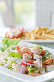 mixed  vegetable with   shrimp and squid , Thai spicy salad
