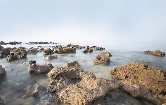Nature image of Sea and rocky coast in the morning in Thailand