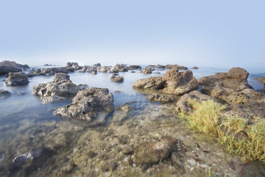Nature image of Sea and rocky coast in the morning in Thailand