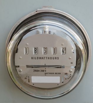 Residential electric power supply meter clearly showing the kilowatt-hours of consumed energy