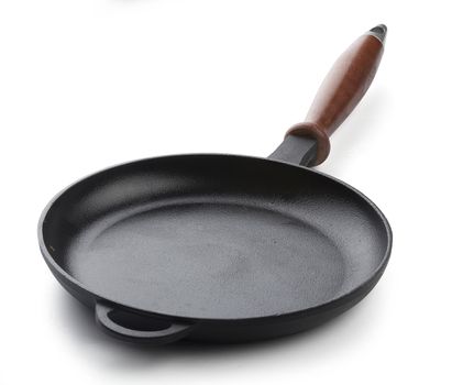The cast iron frying pan on the white background