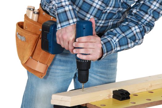 Man using a cordless drill