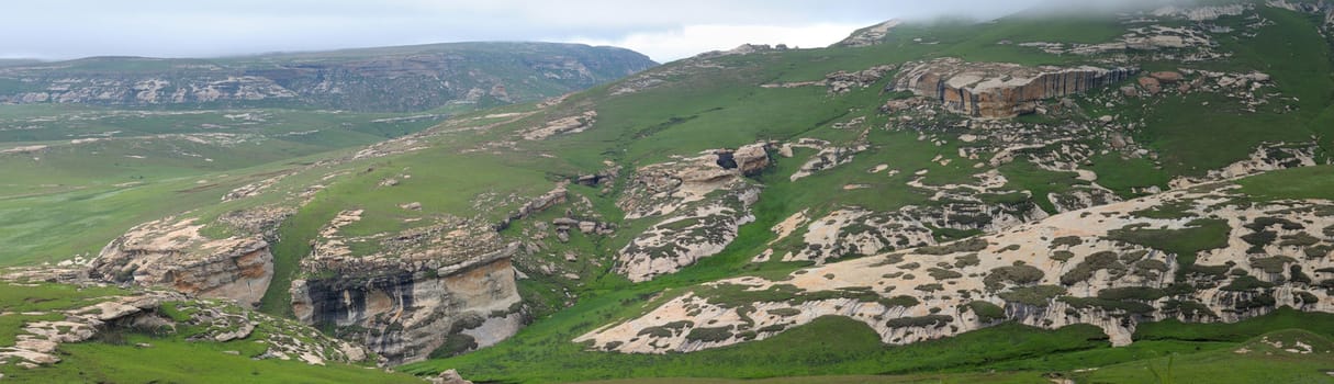 Sandstone cliffs in the Golden Gate Highlands National Park, South Africa. Stitched panorama from 3 separate photos