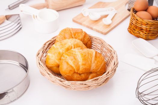 Fresh ้homemade croissant Placed on the table along with equipment for the bakery.