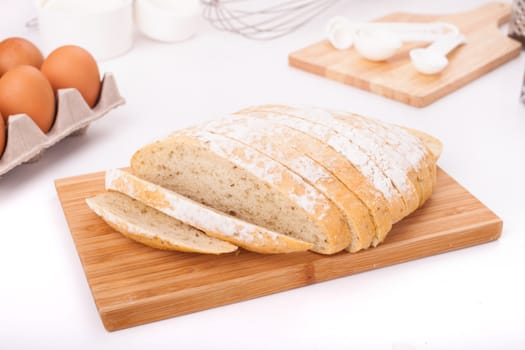 Fresh bread, cut into strips Placed on the table along with equipment for the bakery.