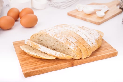 Fresh bread, cut into strips Placed on the table along with equipment for the bakery.