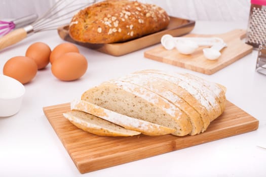 Fresh bread, cut into strips Placed on the table along with equipment for the bakery.