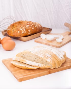 Fresh bread, cut into strips Placed on the table along with equipment for the bakery.