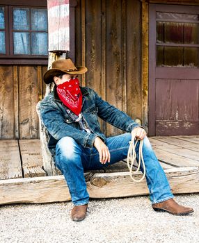 SOUTH WEST - A cowboy takes time to rest and reflect.