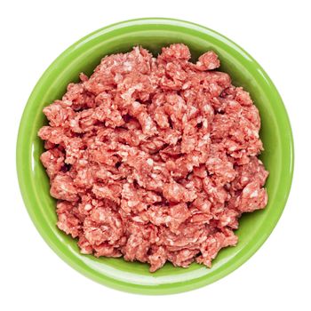 low cholesterol, grass fed, ground buffalo meat in ceramic bowl isolated on white