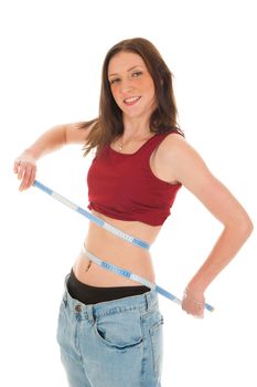 a girl with a measure tape, celebrating her success of loosing weight