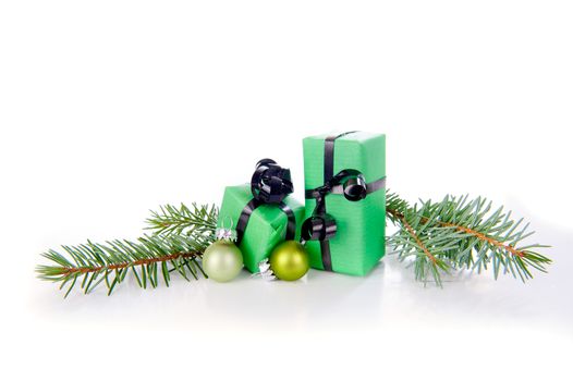 Christmas presents in green on a white background