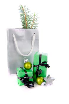 Christmas presents in green on a white background