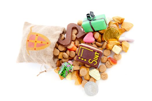 A jute bag full of pepernoten and other candy, for celebrating a dutch holiday " Sinterklaas "  on the fifth of December