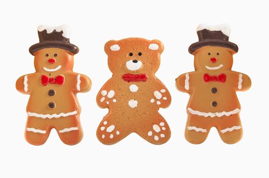 Gingerbread cookies isolated over white background with clipping path.