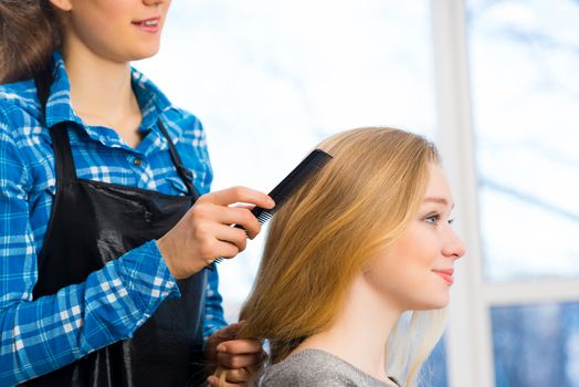 young attractive woman hairdresser hairstyle customer picks