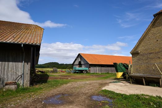Traditional classical old farm yard and wooden barns