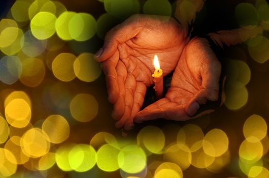 Praying with candle light
