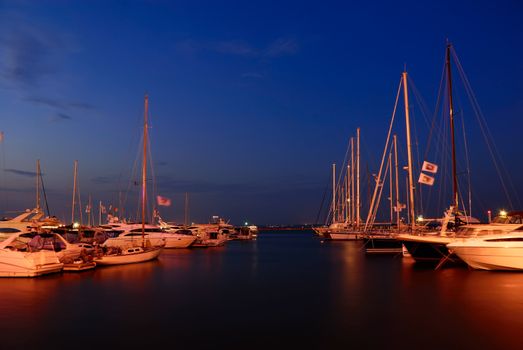 yachts in the marina at twilight