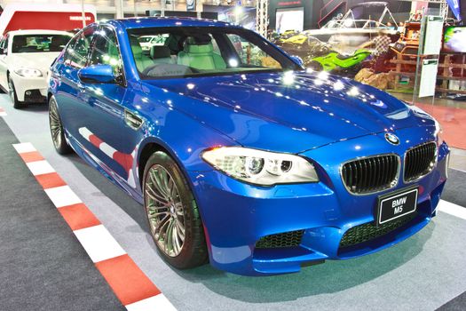 BANGKOK - JUNE 23 : BMW M5 show at The second Bangkok International Auto Salon 2013, the largest and most magnificent Modified Car and automobile accessories show in Bangkok, Thailand.