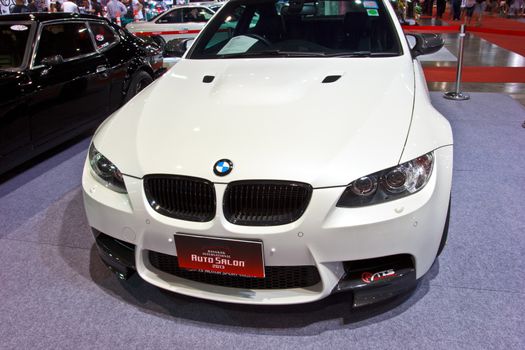 BANGKOK - JUNE 23 : White BMW show at show at The second Bangkok International Auto Salon 2013, the largest and most magnificent Modified Car and automobile accessories show in Bangkok, Thailand.