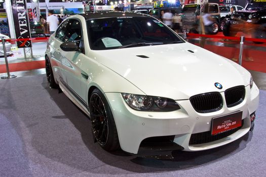 BANGKOK - JUNE 23 : White BMW show at show at The second Bangkok International Auto Salon 2013, the largest and most magnificent Modified Car and automobile accessories show in Bangkok, Thailand.