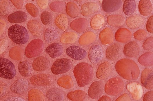 The decorative stone wall ,  red background texture