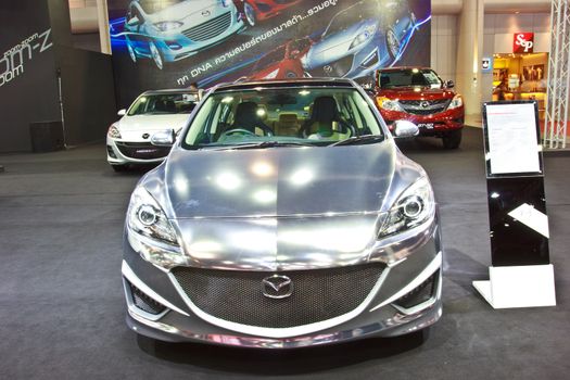 BANGKOK - JUNE 23 : NEW MAZDA 3  show at the second Bangkok International Auto Salon 2013, the largest and most magnificent Modified Car and automobile accessories show in Bangkok, Thailand.