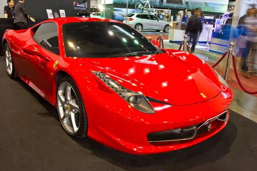 BANGKOK - JUNE 23 : RED FERRARI  show at the second Bangkok International Auto Salon 2013, the largest and most magnificent Modified Car and automobile accessories show in Bangkok, Thailand.