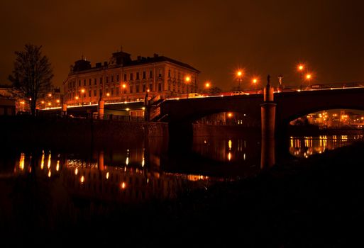 Old traditional arch bridge in the dark