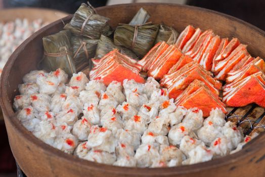 Steamed Chinese food in a bamboo steamer