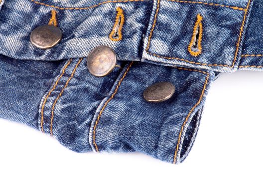 Unfasten Buttons on Blue Jeans closeup on white background