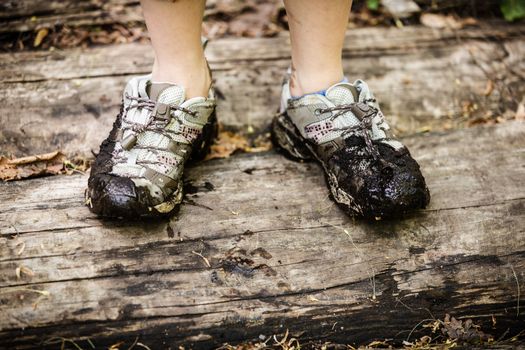 Shoes dirty with mud and water