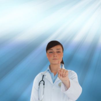 Composite image of young brunette doctor pointing on blue shiny background