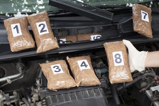 Drug smuggled in a car's engine compartment