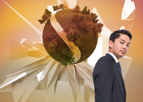 Composite image of asian businessman against earth floating before abstract background