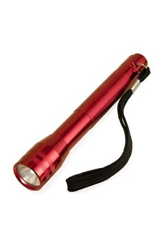 Red metallic flashlight isolated on white background