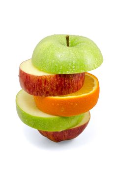 Apple and orange slices isolated on white background