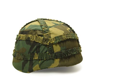 A military helmet of camouflage isolated on white background