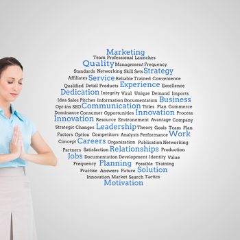 Composite image of peaceful young businesswoman praying while posing