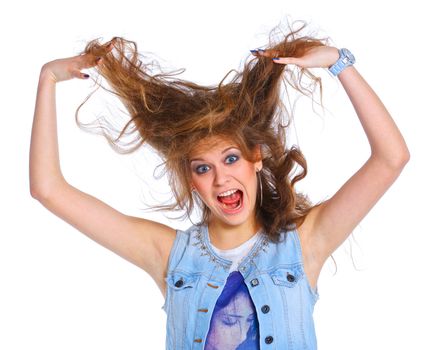 Teenagre girl grimacing. Face portrait against white background