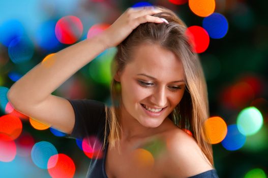 Woman dancing in a nightclub and smiling