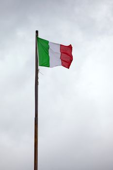 Italian national flag on a mast