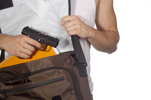A student pulls a gun out of school bags.