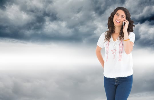 Composite image of attractive casual brunette having phone call