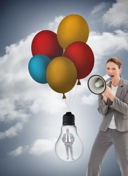 Composite image of businesswoman is talking  on a megaphone 