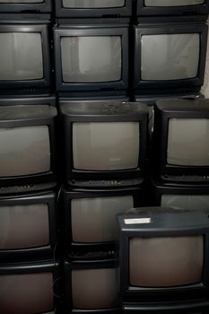 Old TV sets in a pile